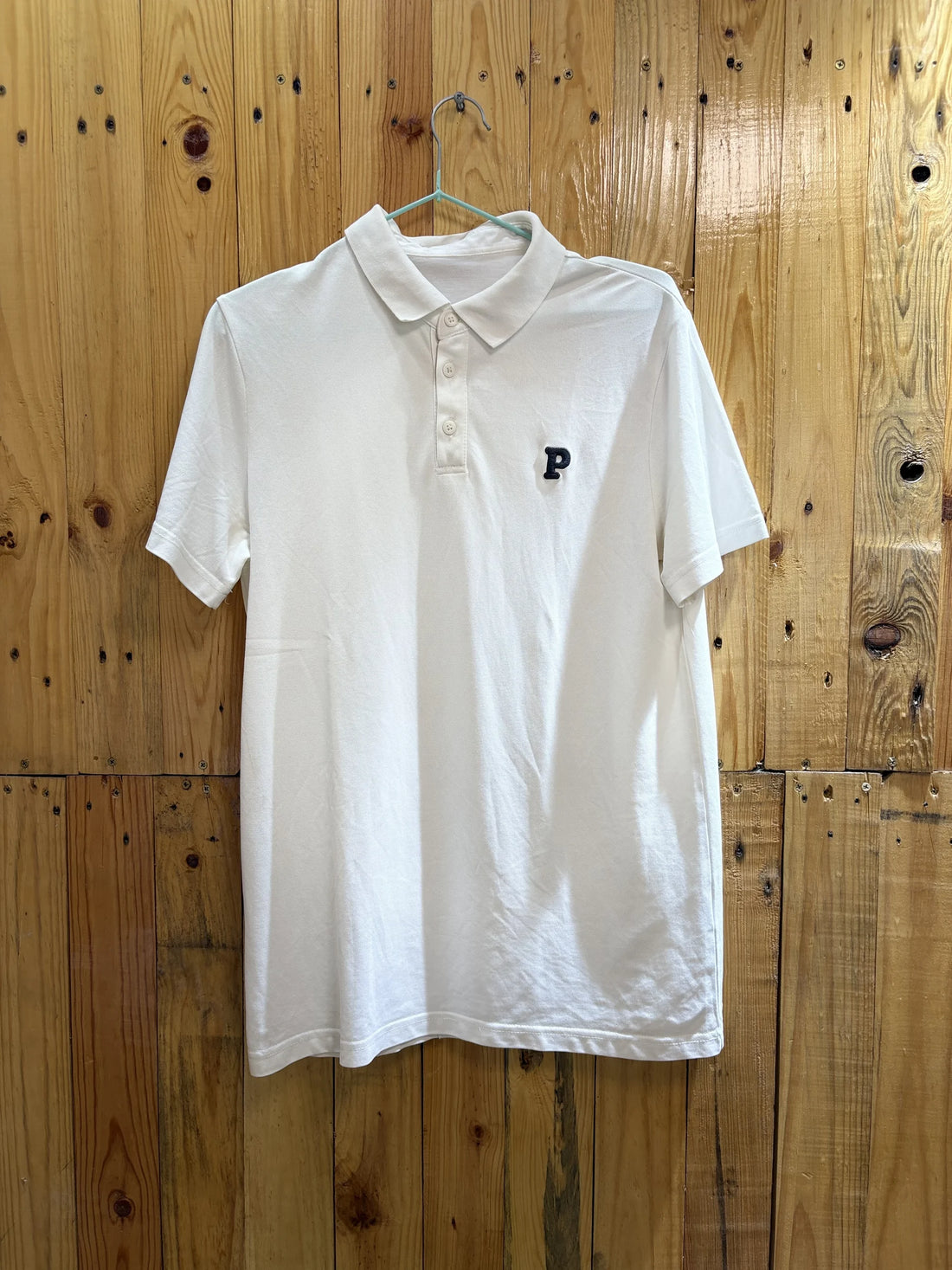 Polo blanc initiale P