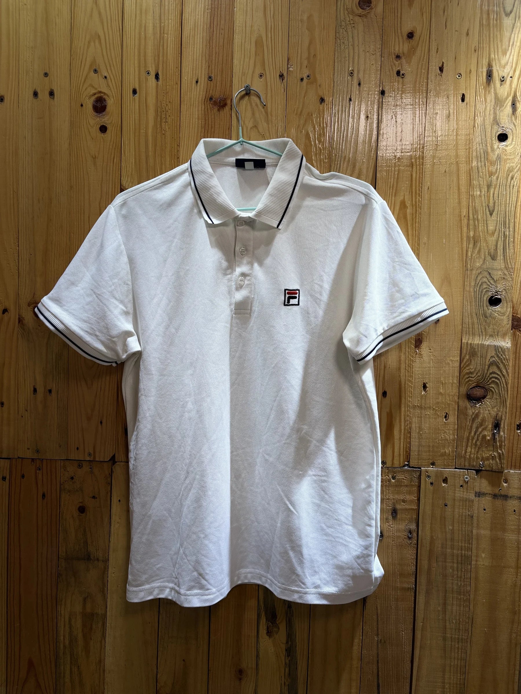 Polo blanc liseré noir