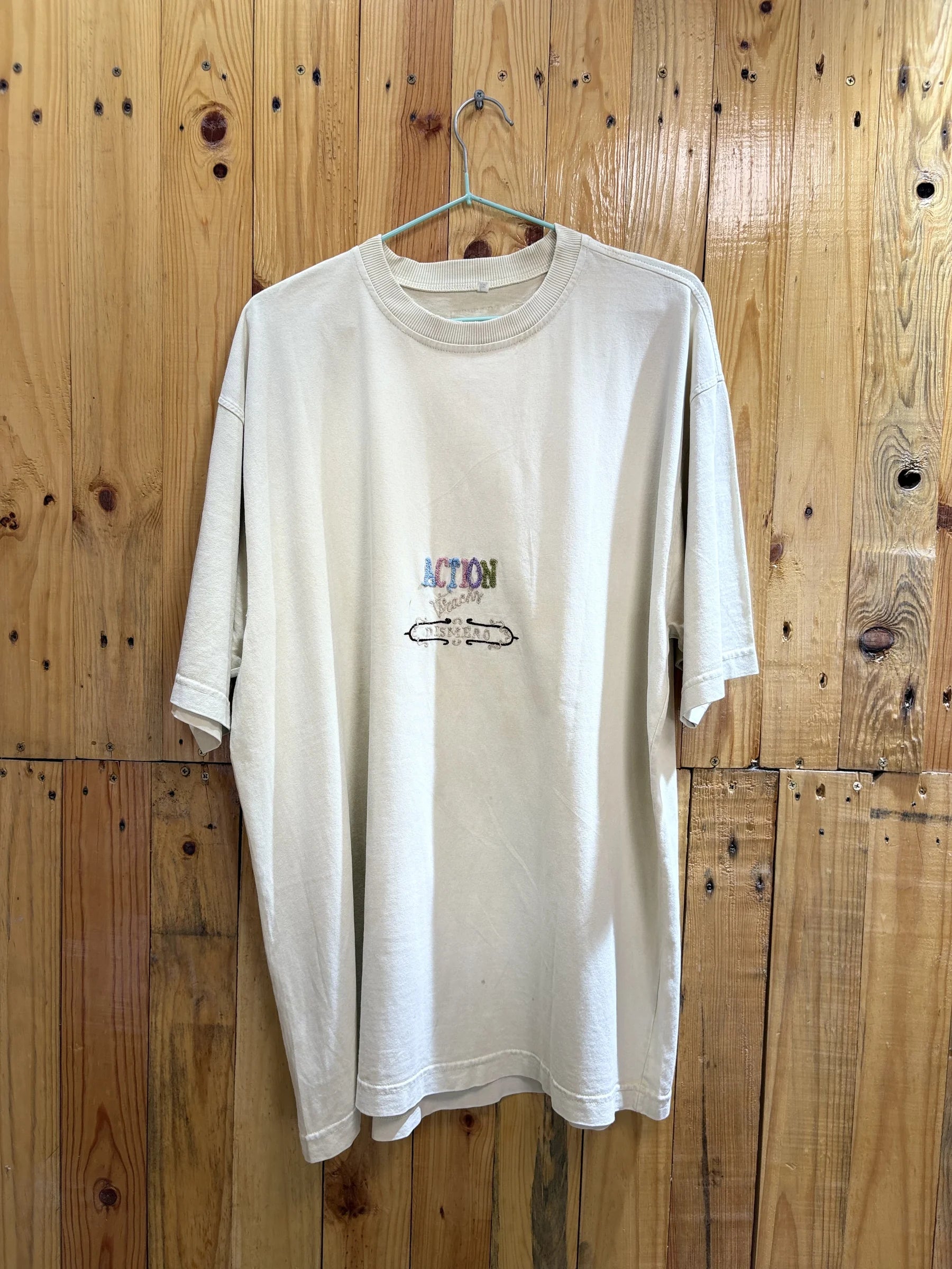 T-shirt écru motif Action
