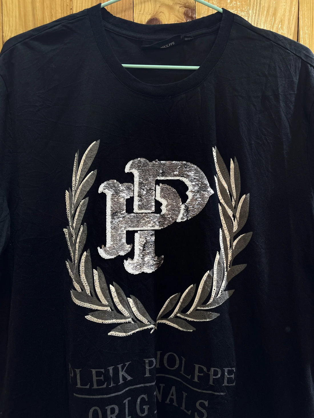 T-shirt noir emblème doré