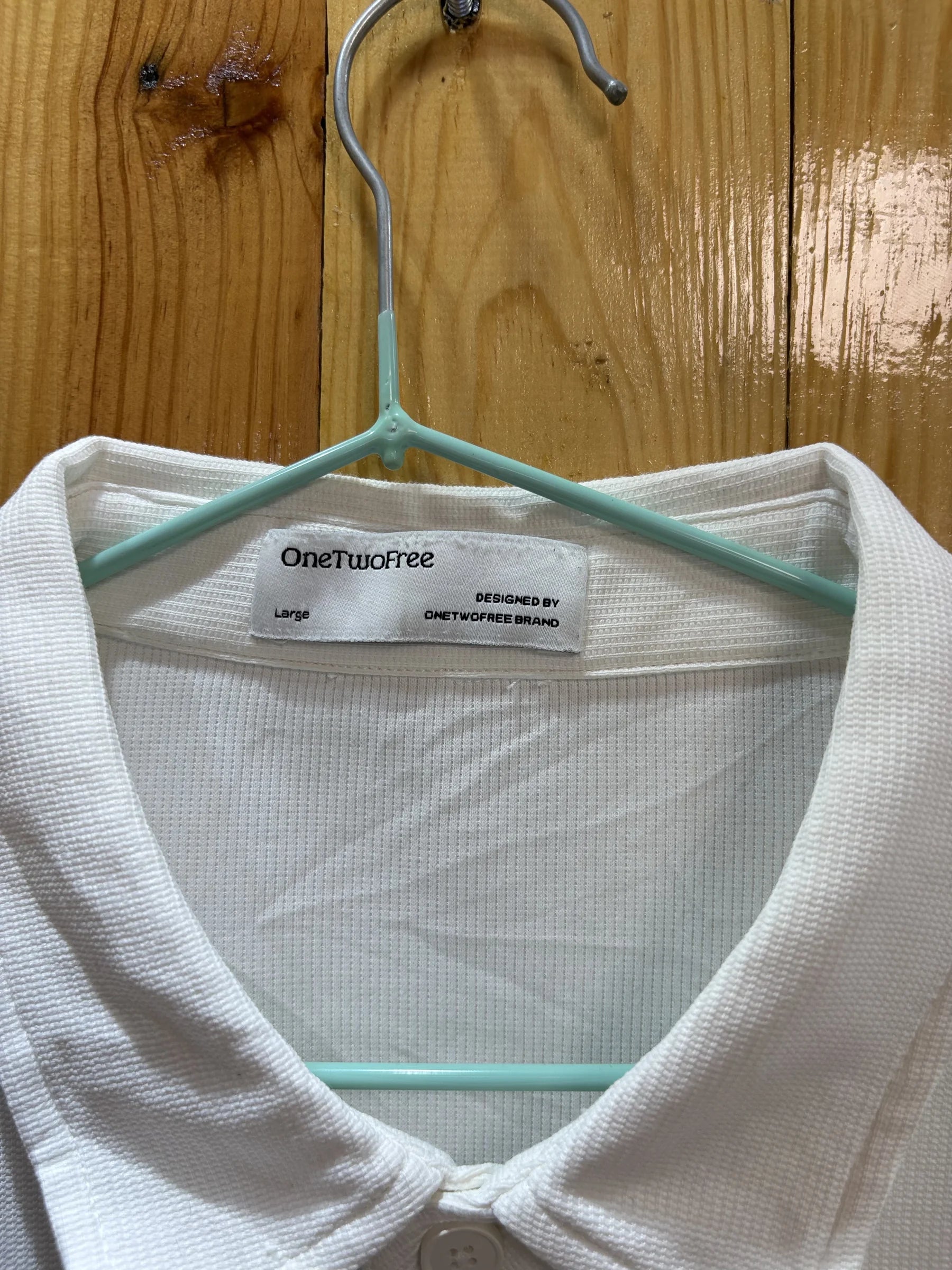 Polo blanc poche zippée