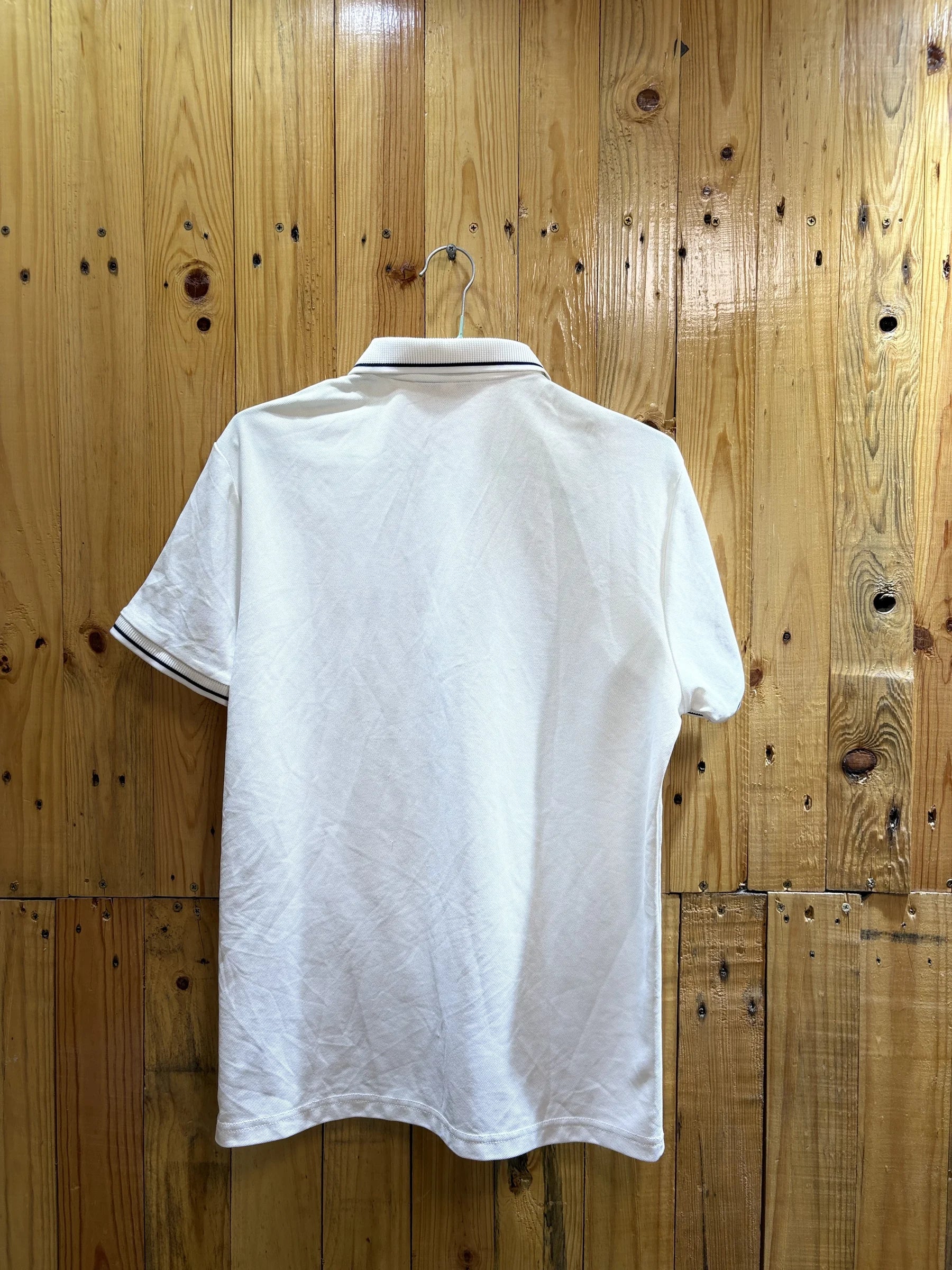Polo blanc liseré noir