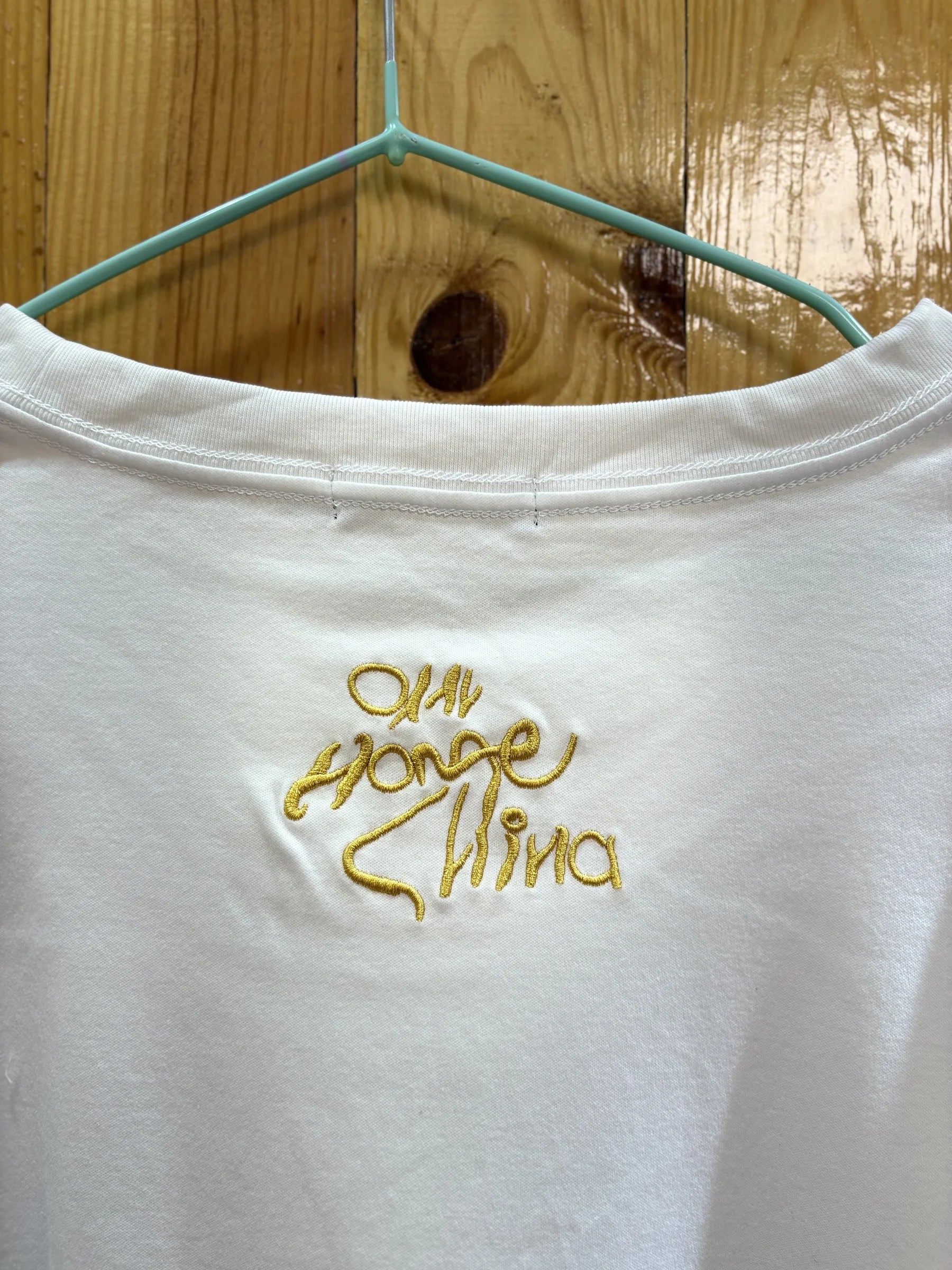 T-shirt blanc motif musical doré