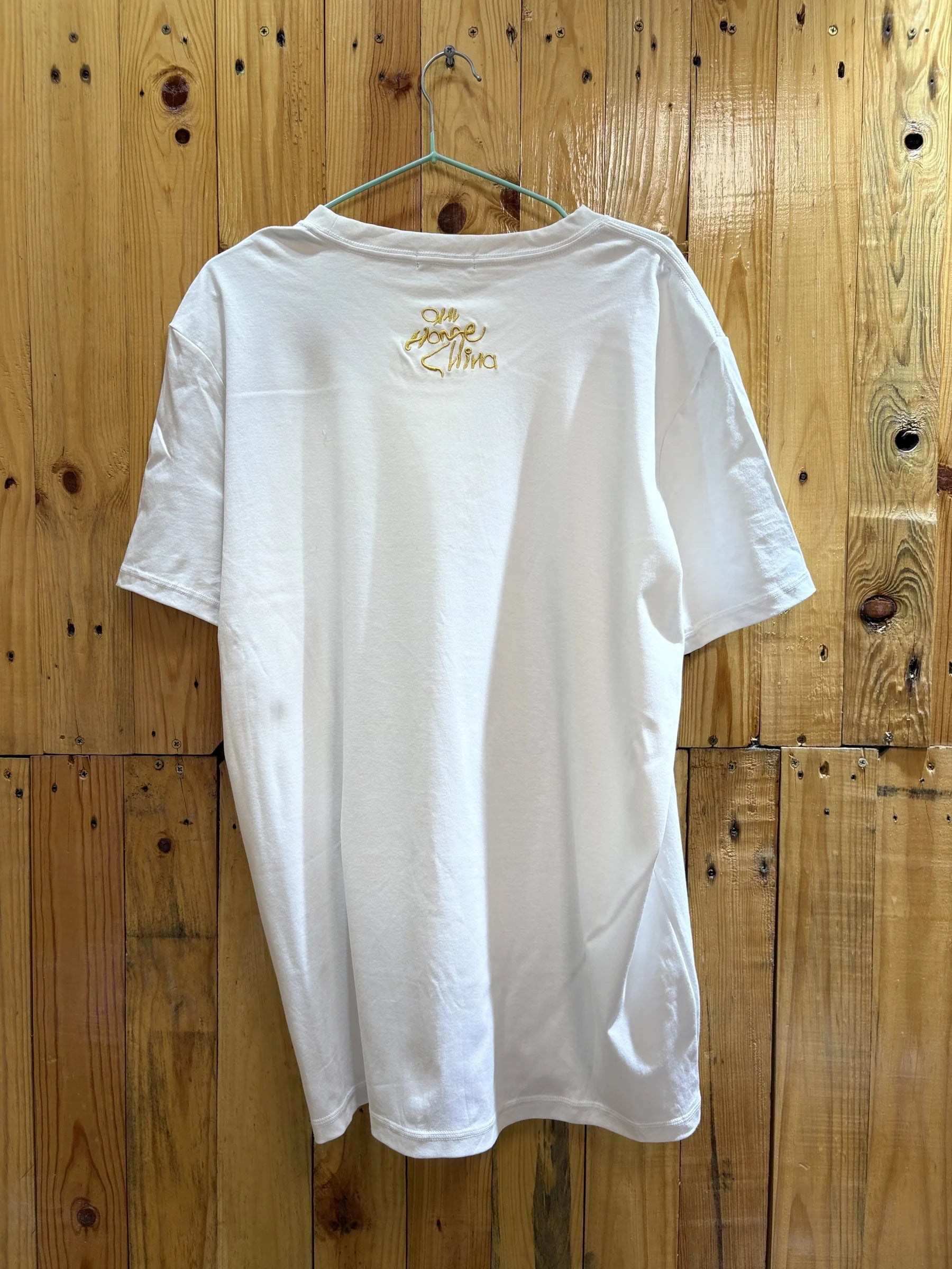 T-shirt blanc motif musical doré